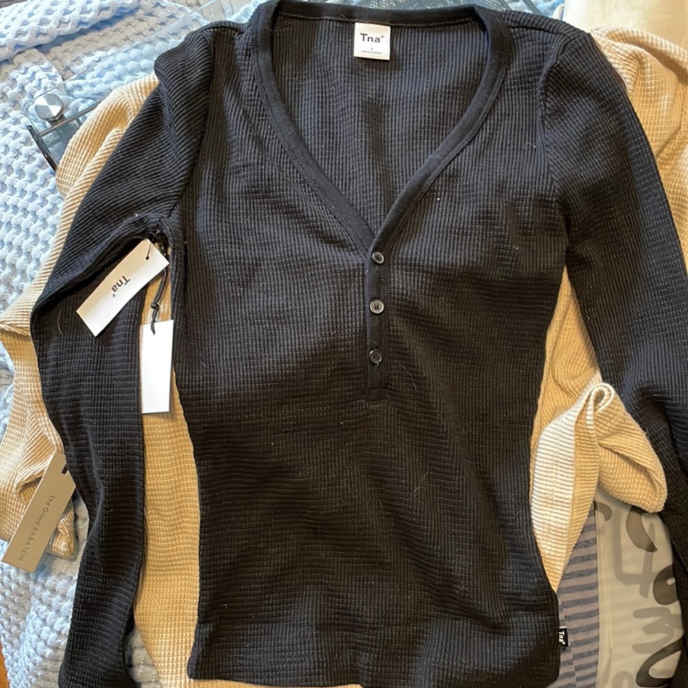 Tna size small